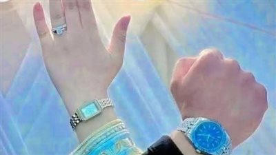 المراه وماكينه الخياطه