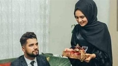 المراه وماكينه الخياطه